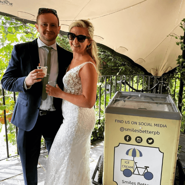 Bride and Groom enjoying ice cream at their wedding